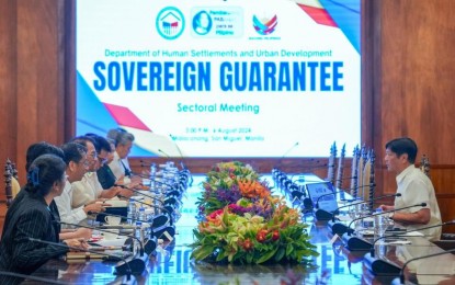 <p><strong>4PH PROGRAM</strong>. President Ferdinand R. Marcos Jr. convenes a sectoral meeting with officials from the Department of Human Settlements and Urban Development at Malacañan Palace in Manila on Tuesday (Aug. 6, 2024) to discuss the proposed sovereign guarantee to implement the Pambansang Pabahay Para sa Pilipino (4PH) Program. In a Facebook post, Marcos said the new housing target should be based on “need and demand”. <em>(Photo from PBBM's official Facebook page)</em></p>