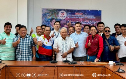 <p><strong>TRANSPORT MEET.</strong> Department of Transportation Secretary Jaime Bautista (middle, foreground) with transport group leaders under the Angat Kooperatiba at Korporasyon ng Alyansang Pilipino para sa Modernisasyon during a press conference at the Land Transportation Franchising and Regulatory Board headquarters in Quezon City on Friday (Aug. 9, 2024). Bautista backed the call of transport groups for a national summit on the Public Transport Modernization Program to help address issues and concerns on the program. <em>(Photo courtesy of DOTr)</em></p>