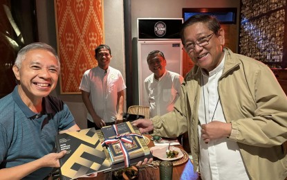 <p><strong>BOOKS DONATION.</strong> Prof. Regalado Trota Jose Jr., chairperson of the National Historical Commission of the Philippines (left), hands over reading materials to Dumaguete Bishop Julito Cortes on Thursday (Aug. 8, 2024). Jose highlighted the need to beef up the inclusion of history subjects in curriculums. (<em>PNA photo by Mary Judaline Flores Partlow)</em></p>