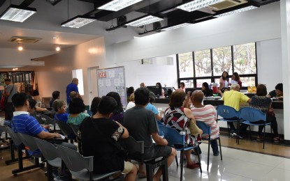 <p><strong>PRODUCTIVE ELDERLY.</strong> Senior citizens transact at the Office for Senior Citizens Affairs at the Iloilo City hall in this undated photo. The city government will introduce "Project Uswag para sa mga Katigulangan,” a livelihood project to teach senior citizens arts and crafts for sustainable income-generating activities this August 2024. <em>(File photo from Iloilo City Government)</em></p>