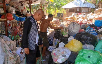 <p><strong>WASTE SEGREGATION.</strong> A Municipal Environment and Natural Resources Office (MENRO) personnel visits a barangay material recovery facility as part of the information and education campaign in this undated photo. MENRO chief Madelyn Pagunsan said in an interview Friday (Aug. 9, 2024) they are urging residents, institutions, and establishment owners to practice waste segregation at source. (<em>Photo courtesy of MENRO San Jose de Buenavista)</em></p>