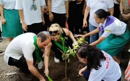 <p><strong>TREES OF HOPE.</strong> Israel Ambassador to the Philippines (left) plants a molave tree at a garden inside the San Francisco High School in Quezon City with Israel Deputy Chief of Mission Esty Buzgan (center) and officials of the school to commemorate the 67th Israel-Philippines Friendship Day on Friday (Aug. 9, 2024). He said trees symbolize hope, peace and prosperity in Jewish tradition. <em>(PNA photo by Ma. Teresa P. Montemayor)</em></p>