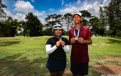 <p><strong>WINNERS.</strong> Cliff Nuñeza (right) and Ally Gaccion win in the 16-18 category of the ICTSI JPGT Mindanao Series 3 at Del Monte Golf Club in Bukidnon on Friday (Aug. 9, 2024). They will compete in the final leg at Pueblo de Oro in Cagayan de Oro starting on Aug. 12. <em>(Contributed photo) </em></p>