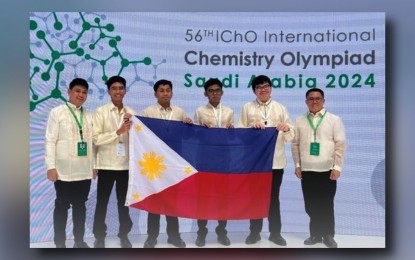 <p>Team Philippines' Gelraycs Jules Fornan, Jacob Emmanuel Sadorra, Ogden Michael Javier and Rex Alphonse Reventar (2nd to 5th from left) with their mentors at the 56th International Chemistry Olympiad in Riyadh, Saudi Arabia <em>(DOST photo)</em></p>