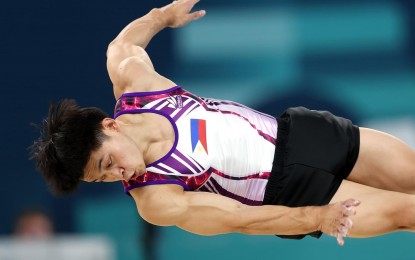 <p><strong>DOUBLE GOLD</strong>. Carlos Yulo in action at the 2024 Paris Olympic Games in July. He ruled the floor exercise and vault events of the men’s artistic gymnastics to become the first Filipino athlete to win two golds in the quadrennial Summer Games. <em>(Photo courtesy of Olympics.com)</em></p>