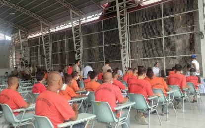 <p><strong>DETAINEE REGISTRATION.</strong> Qualified persons deprived of liberty (PDLs) take part in the special voters' registration at the New Bilibid Prison in Muntinlupa City on Monday (Aug. 12, 2024). The Bureau of Corrections said there are about 2,431 PDLs who were allowed to participate in the special registration by the Commission on Elections. <em>(Photo courtesy of BuCor PIO)</em></p>