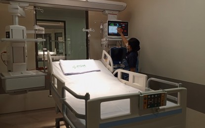 <p><strong>STATE-OF-THE-ART ICU.</strong> A nurse manipulates a monitor installed in one of the 32 rooms at the Central Intensive Care Unit (CENICU) inside the University of the Philippines-Philippine General Hospital (UP-PGH) on Tuesday (Aug. 13, 2024). The UP-PGH formally opened the CENICU and the Positron Emission Tonography-Computed Tonography (PET-CT) Center to provide cancer patients and other patients needing accurate diagnosis of disease entities of neurology cardiology, infection, and inflammation. <em>(PNA photo by Ma. Teresa P. Montemayor)</em></p>