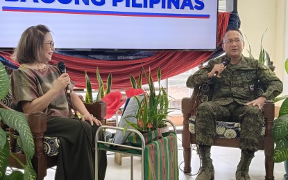 <p><strong>PEACEFUL LIFE</strong>. BGen. Romualdo Raymund Landingin (right), 503rd Infantry Brigade Commander under the 5th Infantry Division (5ID) of the Armed Forces of the Philippines, which has jurisdiction in the Cordillera Administrative Region, during the Kapihan sa Bagong Pilipinas press briefing on Tuesday (Aug. 13, 2024) in Baguio City. He said the presence and strength of rebel groups in the Cordillera have weakened due to the various anti-insurgency programs of the government and more people who prefer to live in peace.<em> (PNA photo by Liza T. Agoot)</em></p>