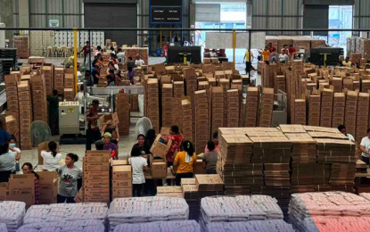 <p><strong>DISASTER RESPONSE</strong>. Volunteers help repack family food packs (FFPs) at the Department of Social Welfare and Development’s National Resource Operations Center in Pasay City in this undated photo. The DSWD on Thursday (Sept. 5, 2024) said it has adequate supply of FFPs and other relief items for augmentation to local government units affected by Severe Tropical Storm Enteng and future weather disturbances. <em>(Photo courtesy of DSWD)</em></p>