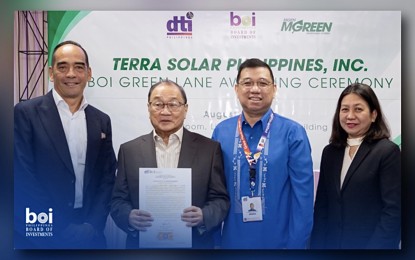 <p><strong>LARGEST SOLAR PROJECT</strong>. Meralco chairman and CEO Manny Pangilinan (2nd from left) and Board of Investments (BOI) Chair and Trade Undersecretary Ceferino Rodolfo (2nd from right) attend the Green Lane Certificate Awarding of the 3,500-MW Terra Solar Project at the Meralco Business Center Lopez Building, Ortigas Ave, Quezon City on Aug. 5, 2024. Joining them were MGen president and CEO Emmanuel Rubio (left) and BOI Governor Marjorie Ramos-Samaniego (right). <em>(Courtesy of BOI)</em></p>