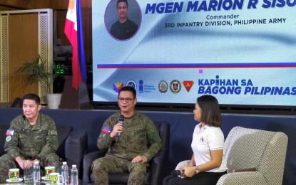 <p><strong>NO REBEL RECRUITMENT.</strong> 3ID commander Maj. Gen. Marion Sison (center) says their intelligence report showed no new students are joining the ranks of the New People’s Army, during the Kapihan sa Bagong Pilipinas on Tuesday (Aug. 13, 2024). For the past two years, he said the Regional Task Force to End Local Communist Armed Conflict has been visiting schools and universities to prevent recruitment activities by rebels. <em>(PNA photo by Perla G. Lena)</em></p>