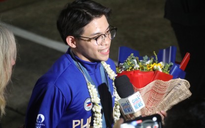 <p>Two-time Olympic gold medalist Carlos Yulo <em>(PNA photo by Avito Dalan)</em></p>