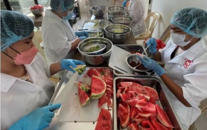 <p><strong>HEALTHY PRESERVATIVE.</strong> The University of Antique-Integrated Research Center (UA-IRC) processes watermelon into powder in this photo taken on Tuesday (Aug. 13, 2024). Danica Marie Aposaga, UA-IRC Product Standardization Officer, said in an interview Wednesday (Aug. 14) that they discovered that the watermelon waste made into Watermelon Powders (WamPow) is a healthy food preservative. <em>(Photo courtesy of UA-IRC)</em></p>