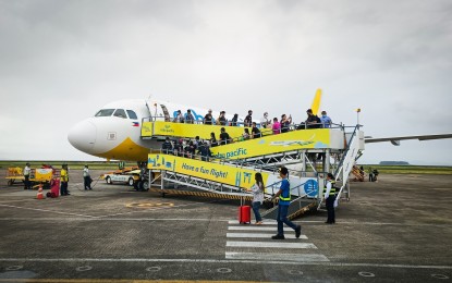 <p><strong>NEW ROUTE</strong>. Passengers disembark from a Cebu Pacific aircraft at the Tacloban Airport in this undated photo. The opening of an air route connecting Eastern Visayas to Mindanao through the Davao-Tacloban-Davao flight will bring more development to the region’s tourism and business sectors, tourism and business stakeholders said on Wednesday (Aug. 14, 2024). <em>(Photo courtesy of DOT- 8) </em></p>