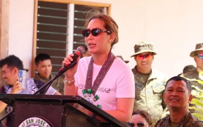 <p><strong>PEACE EFFORTS</strong>. Samar Governor Sharee Ann Tan speaks to soldiers and formers rebels in San Jose de Buan town in this undated photo. The Samar provincial government has released PHP20 million in assistance to former rebels as part of its initiative to help the national government’s peacebuilding efforts<em>. (Photo courtesy of Samar provincial government)</em></p>