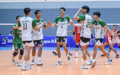 <p><strong>CELEBRATION.</strong> La Salle's Joshua Magalaman (No. 15) celebrates with teammates after the game against Emilio Aguinaldo College in the V-League Men's Collegiate Challenge at the Paco Arena in Manila on August 14, 2024. The Green Spikers won, 25-15, 25-22, 25-21. <em>(Photo courtesy of PVL)</em></p>