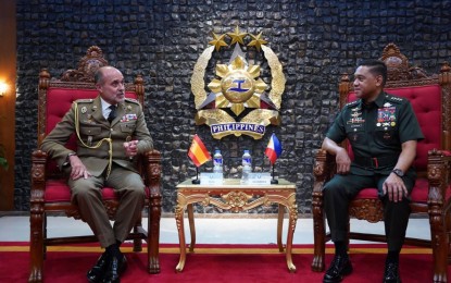 <p><strong>OUTGOING DEFENSE ATTACHE.</strong> Armed Forces of the Philippines chief, Gen. Romeo Brawner Jr., (right) and outgoing defense attaché of Spain, Col. Javier Martin Gil, during the courtesy visit at the AFP general headquarters in Quezon City on Wednesday (Aug. 14, 2024). Brawner honored Gil with the AFP Commendation Medal and Ribbon "in recognition of his dedicated service and contributions to strengthening the defense relations between Spain and the Philippines".<em> (Photo courtesy of the AFP)</em></p>