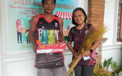 <div dir="auto"><strong>WASTE MANAGEMENT</strong>. Residents of San Nicolas, Ilocos Norte trade in their wastes for household and school essentials in this undated photo. The waste diversion project has reduced the volume of discarded materials in sanitary landfills. <em>(Photo courtesy of PBMES)</em></div>