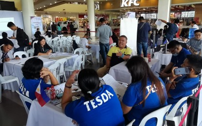 <p><strong>JOB FAIR.</strong> Staff of the Technical Education and Skills Development Authority in this undated job fair in Negros Oriental. TESDA and the Public Employment Service Office of Dumaguete City will hold a job fair on Aug. 27, 2024. <em>(PNA file photo by Mary Judaline Flores Partlow)</em></p>