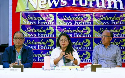 <p>photo<br /><strong>GROWING ECONOMY.</strong> Finance Undersecretary Domini Velasquez (center) shares economic insights during a news forum in Quezon City on Saturday (Aug. 17, 2024). Also present during the forum were Justice Undersecretary Raul Vasquez (left) and former presidential political adviser Ronald Llamas. <em>(PNA photo by Robert Oswald P. Alfiler)</em></p>