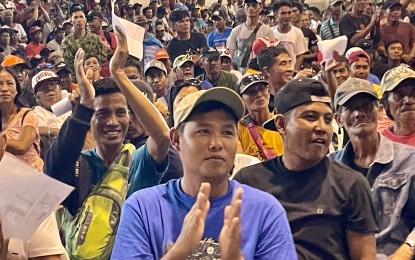 <p><strong>PRESIDENTIAL AID.</strong> Farmers affected by El Nino are all smiles after receiving PHP10,000 in aid during a distribution on Monday (Aug. 19, 2024) at the Centennial Arena in Laoag City, Ilocos Norte province. A total of PHP50 million was released to aid 5,000 recipients under the President’s Assistance to Farmers, Fisherfolk, and Families (PAFFF) program.<em> (Photo by Leilanie Adriano)</em></p>