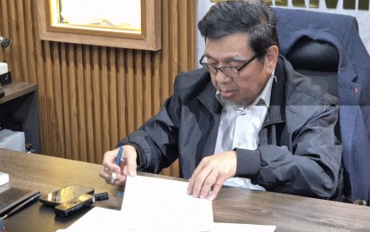 <p><strong>FIRST IN BARMM.</strong> Bangsamoro Labor Minister Muslimin G. Sema signs the new wage order issued by the Regional Wages and Productivity Board on Monday (Aug. 19, 2024). The law grants house helpers a minimum of PHP5,000 monthly pay. <em>(Photo courtesy of Bandera News TV-Cotabato)</em></p>