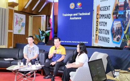 <p><strong>MT. KANLAON PREPS.</strong> Office of Civil Defense 6 (Western Visayas) Director Raul E. Fernandez (center) shares updates on their efforts after the eruption of Mt. Kanlaon, during the Kapihan sa Bagong Pilipinas on Tuesday (Aug. 20, 2024). He said the installation of the demarcation line marking the 4-km. radius permanent danger zone around Mt. Kanlaon is ongoing. <em>(PNA photo by Perla G. Lena)</em></p>