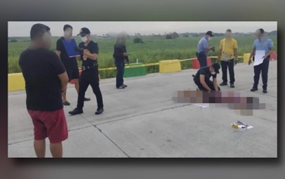 <p><strong>MENACE NO MORE.</strong> Police officers inspect the site of a pursuit operation in Barangay Cangatba, Porac, Pampanga on Monday (Aug. 19, 2024). Killed in the encounter was Jojo Fajardo, a notorious hired killer who is wanted for a string of murder cases. <em>(Photo courtesy of PRO-3)</em></p>