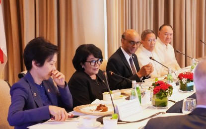 <p><strong>PARTNERS ON CLIMATE ACTION. </strong>DENR Secretary Maria Antonia Yulo-Loyzaga (2nd from left) and Singaporean Minister for Sustainability and the Environment Grace Fu Hai Yien (left) discuss mutual efforts on climate action cooperation in a luncheon for Singaporean President Tharman Shanmugaratnam (center) at the The Peninsula Manila in Makati City on Aug. 16, 2024. The two countries committed to deepen cooperation in exploring solutions towards climate resiliency. <em>(Photo courtesy of DENR)</em></p>