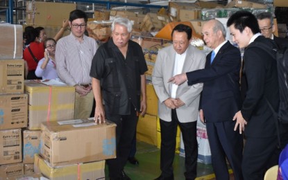 <p><strong>PHLPOST GUEST</strong>. Japan’s State Minister for Foreign Affairs Tsuge Yoshifumi (4th from left) visits one of the facilities of the Philippine Postal Corp. (PHLPost) in Metro Manila on Tuesday (Aug. 20, 2024). Tsuge also met with PHLPost officials to discuss how Japan could help PHLPost improve its postal services through digitalization.<em> (Photo courtesy of PHLPost)</em></p>