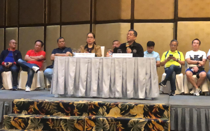 <p><strong>NEW VCM</strong>. Commission on Elections chief George Edwin Garcia (right, sitting at table) and Commissioner Aimee Ferolino brief the media on the agency’s preparation for the 2025 midterm elections in Cagayan de Oro City on Wednesday (Aug. 21, 2024). One of the updates includes the procurement of new vote-counting machines for the polls.<em> (Photo courtesy of CIO)</em></p>