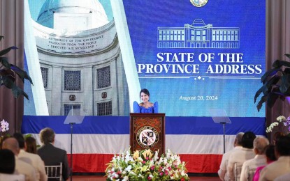 <p><strong>STATE OF THE PROVINCE.</strong> Cebu Governor Gwendolyn Garcia delivers the State of the Province Address at the Cebu Provincial Capitol on Tuesday night (Aug. 20, 2024). Garcia vowed to translate the position of Cebu as the country’s richest province to more projects that will benefit its constituents.<em> (Photo courtesy of Cebu Capitol PIO)</em></p>