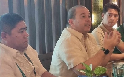 <p><strong>MEETING.</strong> Sugar Regulatory Administration chief Pablo Luis Azcona (center) and board member David Andrew Sanson (left) meet with the leaders of Mindanao Federation of Sugarcane Planters Inc. headed by former Bukidnon Third District Rep. Manuel Antonio Zubiri (right) on the sidelines of the Philippine Sugar Technologists Association Annual National Convention in Cebu City last week. “We will look into establishing an SRA satellite office in Bukidnon to bring our services closer to the farmers,” Azcona said in a statement on Wednesday (Aug. 21, 2024). <em>(Photo courtesy of Sugar Regulatory Administration)</em></p>