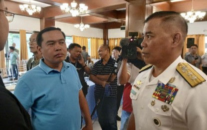 <p>PN spokesperson for West Philippine Sea Rear Adm. Roy Vincent Trinidad (right) <em>(PNA photo by Priam F. Nepomuceno)</em></p>