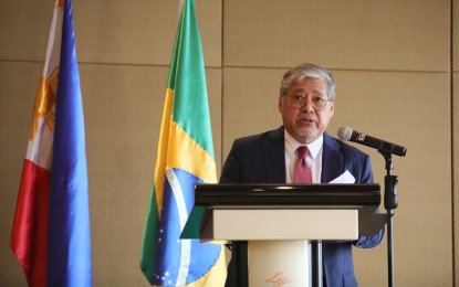 <p><strong>SPEECH.</strong> Foreign Affairs Secretary Enrique Manalo delivers his remarks following a bilateral meeting with visiting Brazilian Foreign Minister Mauro Vieira at the Diamond Hotel in Manila on Friday (Aug. 23, 2024). The two ministers also signed two agreements at the event. <em>(PNA photo by Avito Dalan)</em></p>