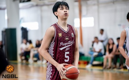 <p><strong>TOP SCORER.</strong> Perpetual Help's TJ Tabbuan at the freethrow line during their game against La Salle Green Hills in the Next Generation Basketball League at Aero Center in Quezon City on Saturday (Aug. 24, 2024). Perpetual won, 84-76, with Tabbuan scoring 21 points. <em>(Photo courtesy of NGBL)</em></p>