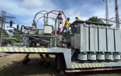 <p><strong>POWER AUGMENTATION</strong>.  The 10 megavolt amperes mobile transformer loaned by MORE Power Iloilo to Negros Power and Electric Corp. and being tested at the Alijis substation in Bacolod City Sunday morning (Aug. 25, 2024). The previous 30/37 MVA power transformer broke down on Aug. 21, causing a massive power outage that affected some 47,000 registered consumer-households in the southeastern part of Bacolod. <em>(Screenshot from Negros Power/NEPC video)</em></p>