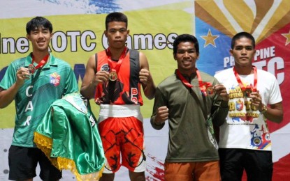 <p><strong>WINNERS.</strong> Podium finishers in the men's boxing light welterweight category pose during the awarding ceremony of the Reserve Officers' Training Corps Games national championships in Indang, Cavite on Saturday (Aug. 24, 2024). From left are Raffy Chagsan of University of Baguio (silver), Benie Tabaco-an of University of Antique (gold), John Loid Lorenzo Makilala of Institute of Science and Technology (bronze) and Jobert Caramihan of STI West Negros University (bronze). <em>(Photo courtesy of Philippine Sports Commission)</em></p>