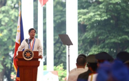 <p><strong>HONORING HEROES.</strong> President Ferdinand R. Marcos Jr. leads the commemoration of National Heroes' Day at the Libingan ng mga Bayani (Heroes Cemetery) in Taguig City on Monday (Aug. 26, 2024). In his message, the President called on Filipinos to be heroes in their own right, defend democracy, rule of law, and the Philippine sovereignty. <em>(PNA photo by Joan Bondoc)</em></p>