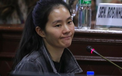 <p><strong>ADMISSION.</strong> Shiela Guo recounts to senators how she and her siblings fled the country during an inquiry at the Senate on Tuesday (Aug. 27, 2024). She also revealed that she is not a biological sister of dismissed Bamban, Tarlac mayor Alice Guo. <em>(PNA photo by Avito C. Dalan)</em></p>