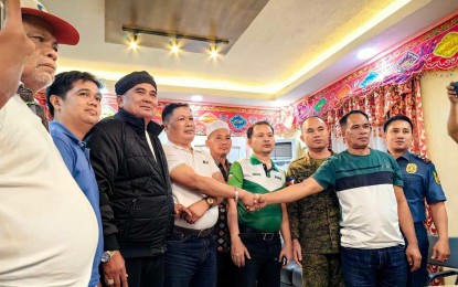 <p><strong>RIDO SETTLEMENT</strong>. Leaders of warring families in Maguindanao del Sur, locked in a long-standing family dispute, agree to end the hostilities and shake hands during a dispute resolution by the Peace, Security, and Reconciliation Office of the Bangsamoro Autonomous Region in Muslim Mindanao in Shariff Aguak, Maguindanao del Sur on Tuesday (Aug. 27, 2024). The Army, police, and three local government units in the province helped facilitate the dispute settlement. <em>(Photo courtesy of PSRO-BARMM)</em></p>