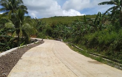 <p><strong>FARM-TO-MARKET ROAD.</strong> The recently completed PHP10-million two-lane road project, spanning 600 meters, in Barangay Prosperidad, San Carlos City, Negros Occidental. “Paved roads facilitate better access to far-flung areas, ensuring safer mobility of people and cost-efficient transport of goods from farm to market,” DPWH-Western Visayas Regional Director Sanny Boy Oropel said in a statement. <em>(Photo courtesy of DPWH Negros Occidental Sub District Engineering Office)</em></p>