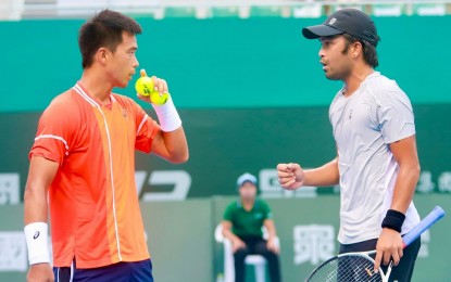 <p><strong>POSITIVE ATTITUDE.</strong> Filipino tennis player Francis Casey Alcantara (right) and doubles partner Fajing Sun at the Jinan Olympic Sports Center Stadium in China in this undated photo. Alcantara on Wednesday (Aug. 28, 2024) said he is keeping a positive attitude as he looks forward to competing in Zhangjiagang, Shanghai and Guangzhou in China in the next three weeks. <em>(Contributed photo)</em></p>