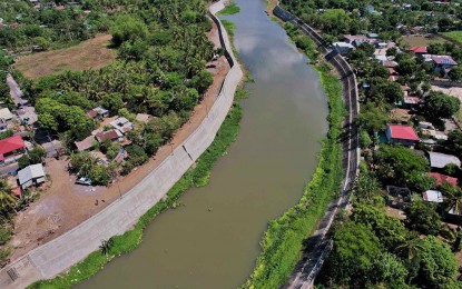 <p><strong>RIVERBANK PROTECTION</strong>. A completed riverbank protection along a portion of Pawili River is designed to protect residents living in a low-lying portion of barangay of Salvacion in Bula, Camarines Sur. The Department of Public Works and Highway on Thursday (Aug. 29, 2024) announced the completion of the PHP93.1-million flood control project. <em>(Photo from DPWH)</em></p>