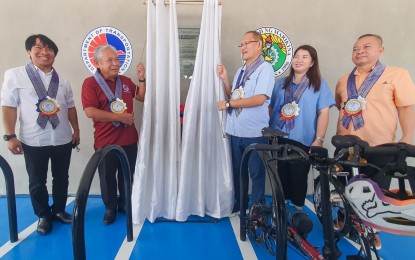 <p><strong>FACILITY FOR CYCLISTS.</strong> Transportation Secretary Jaime Bautista (2nd from left) and Marikina Mayor Marcelino ‘Marcy’ Teodoro (3rd from left) lead the launch of the end-of-trip cycling facility at the Marikina Central Parking Area on Thursday (Aug. 29, 2024). The facility seeks to encourage the public to embrace an active lifestyle and reduce carbon emissions. <em>(Photo courtesy Marikina LGU)</em></p>