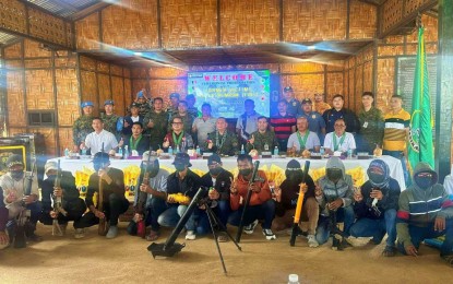 <p><strong>EXHAUSTED REBELS</strong>. A dozen former Moro extremists pose with military and local officials after surrendering to the Army’s 57th Infantry Battalion in Upi, Maguindanao del Norte, on Thursday (Aug. 29, 2024). Maj. Gen. Antonio Nafarrete, commander of the 6th Infantry Division, welcomed them. <em>(Photo courtesy of 6ID)</em></p>