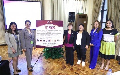 <p><strong>GENDER FAIRNESS</strong>. The Presidential Communications Office (PCO) organizes the first-ever UniComm Gender and Development (GAD) at the Kalayaan Hall of Malacañan Palace in Manila on Thursday (Aug. 29, 2024). During the event, the members of the reconstituted Media and Gender Equality Committee (MGEC) – (from left) Janice Joyce Sison from the Optical Media Board, Divina Daquiaog from the National Telecommunications Commission, Philippine Commission on Women chairperson Ermelita Valdeavilla, Julie Abante from the Film Development Council of the Philippines, PCO Undersecretary Emerald Ridao, and Jesusa Lorenzo from the Movie and Television Review and Classification Board) signed the commitment wall. <em>(Photo from PCO)</em></p>