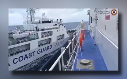 <p><strong>TENSION-FILLED.</strong> A China Coast Guard vessel (left) rams into the Philippine Coast Guard’s BRP Teresa Magbanua in Sabina Shoal on Saturday afternoon (Aug. 31, 2024). Commodore Jay Tarriela, the PCG spokesperson for the West Philippine Sea, is expected to discuss this incident and more during a regional convention of public information officers in Negros Oriental on Sept. 4 to 6, 2024.<em> (Screenshot from PCG video)</em></p>