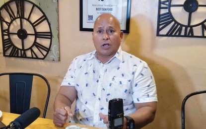 <p><strong>STRESSED.</strong> Senator Ronald “Bato” Dela Rosa answers questions from journalists during a briefing in Tacloban City late Friday (Aug. 30. 2024). He admitted that ongoing hearings at the House of Representatives linking him to extrajudicial killings may affect his reelection bid. <em>(PNA photo by Sarwell Meniano)</em></p>