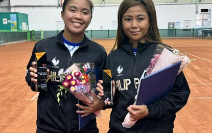 <p><strong>ACHIEVERS.</strong> Filipinos Bien Zoleta-Mañalac (right) and Princess Catindig hold their trophies during the awarding ceremony of the Sunchang Open International soft tennis tournament in South Korea on Sunday (Sept. 1, 2024). Koreans Lee Hangyeol and Kim Koeun won their women's doubles semifinal duel, 5-4 (7). <em>(Contributed photo)</em></p>